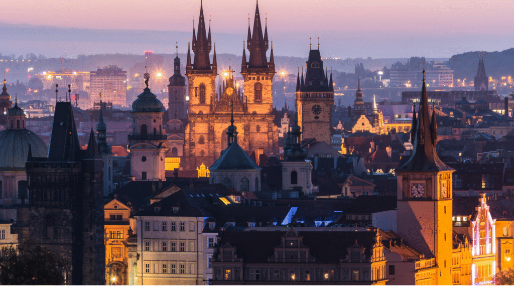Close-up of Gothic arches, ribbed vaults, and stone carvings in a historic church.