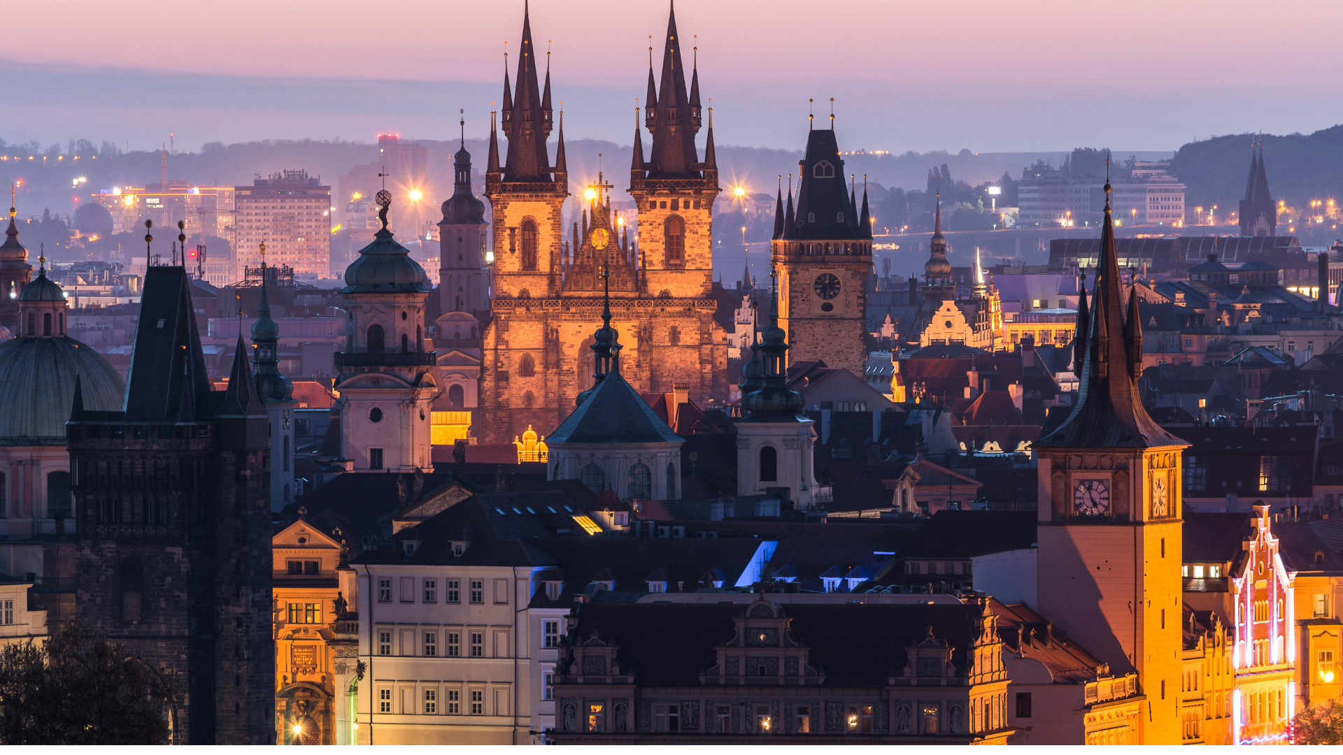 Close-up of Gothic arches, ribbed vaults, and stone carvings in a historic church.
